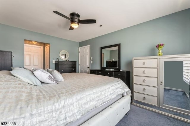 carpeted bedroom with ceiling fan