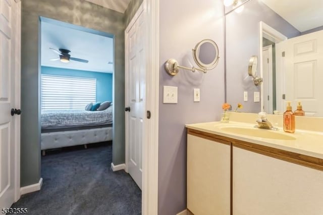 bathroom with vanity and ceiling fan