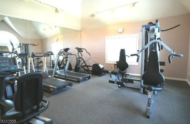 gym featuring track lighting