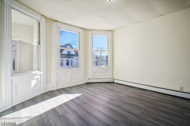 empty room featuring hardwood / wood-style floors