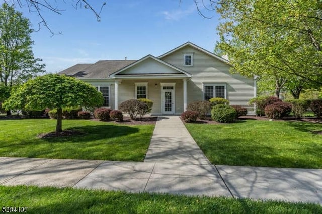 view of front of home with a front lawn