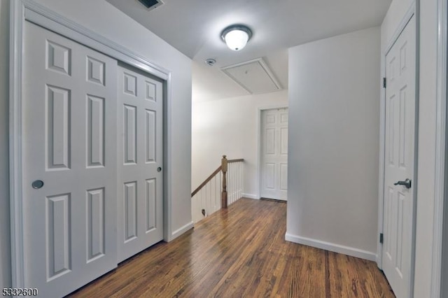 hallway featuring dark hardwood / wood-style flooring