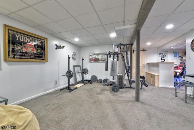 exercise room with carpet flooring