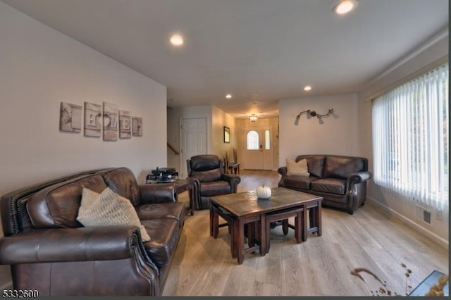 living room with light wood-type flooring