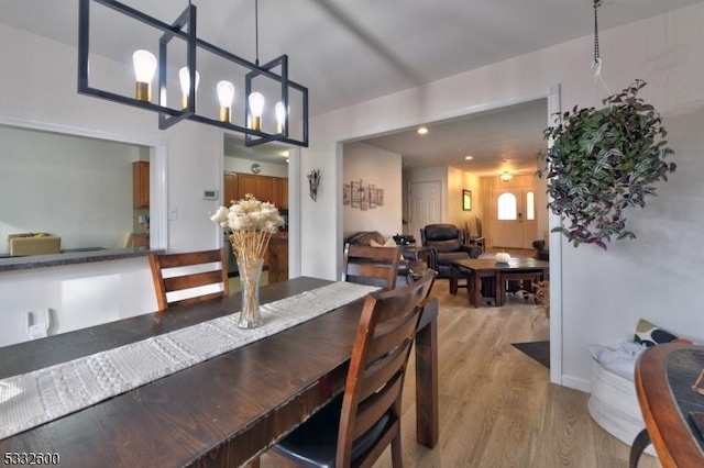 dining space featuring light hardwood / wood-style floors