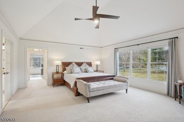 carpeted bedroom featuring vaulted ceiling and ceiling fan