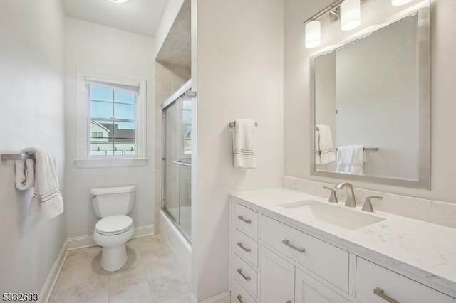 full bathroom with vanity, toilet, and combined bath / shower with glass door