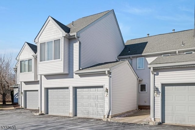 exterior space with a garage