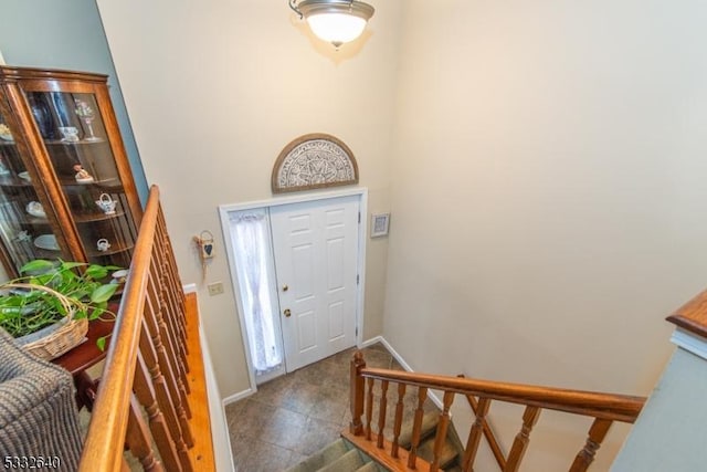 entryway featuring a high ceiling