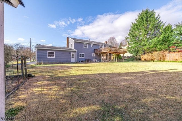 view of yard featuring a wooden deck