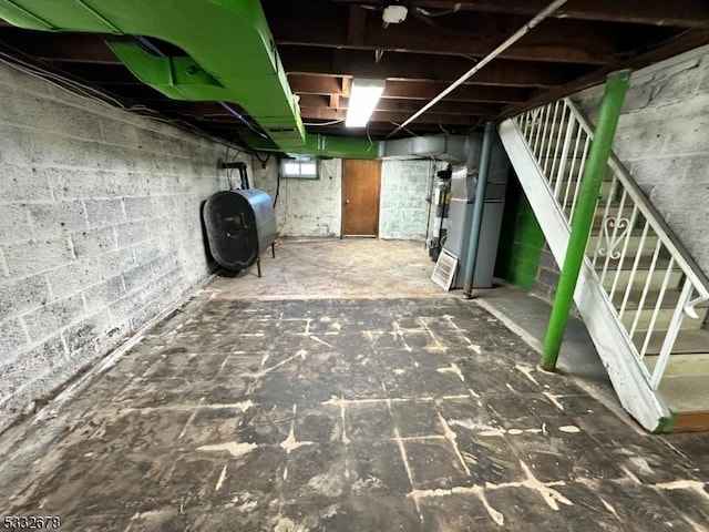 basement featuring heating unit