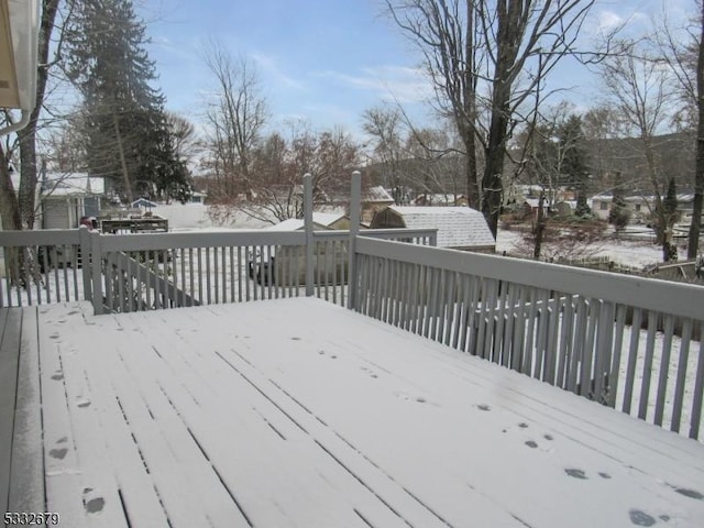 view of snow covered deck