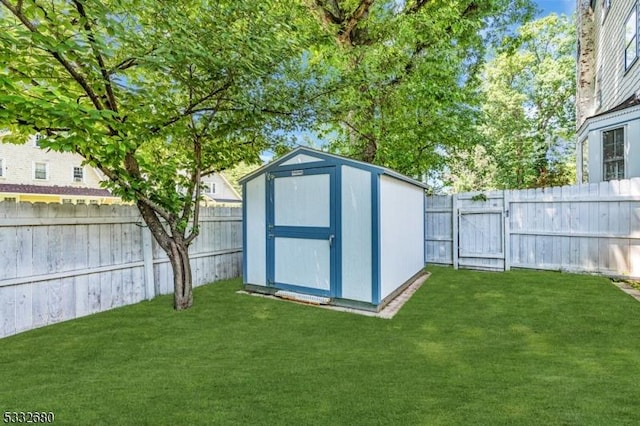 view of outbuilding with a lawn