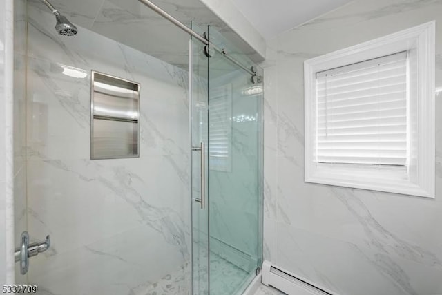 bathroom with a baseboard radiator and a shower with shower door