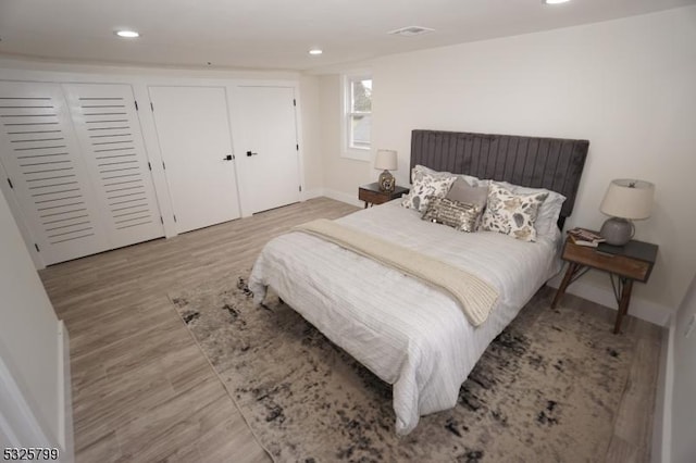 bedroom featuring light hardwood / wood-style flooring