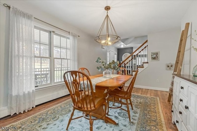 dining room featuring light hardwood / wood-style floors