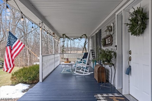 wooden deck with covered porch