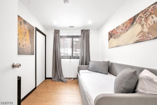 bedroom featuring light hardwood / wood-style floors