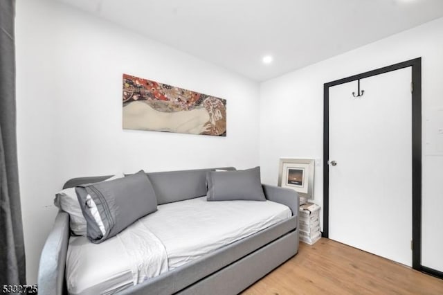 bedroom with light wood-type flooring