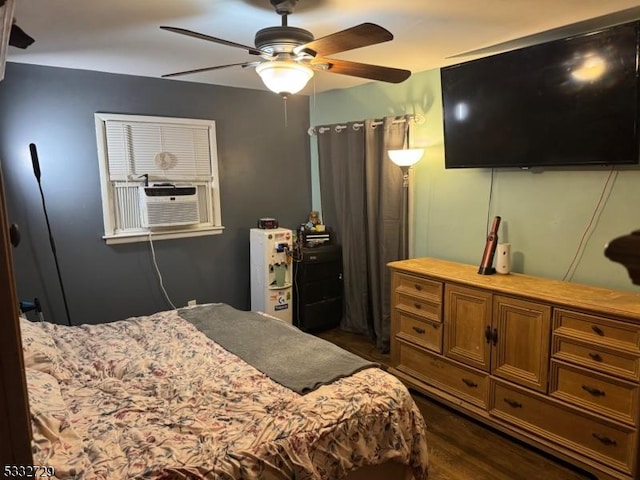 bedroom featuring ceiling fan and dark hardwood / wood-style flooring