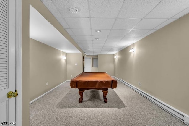 playroom with carpet flooring, a drop ceiling, pool table, and a baseboard radiator