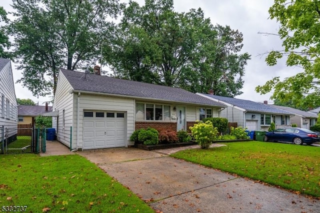 ranch-style home featuring a garage and a front yard