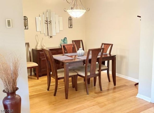 dining room featuring light hardwood / wood-style flooring