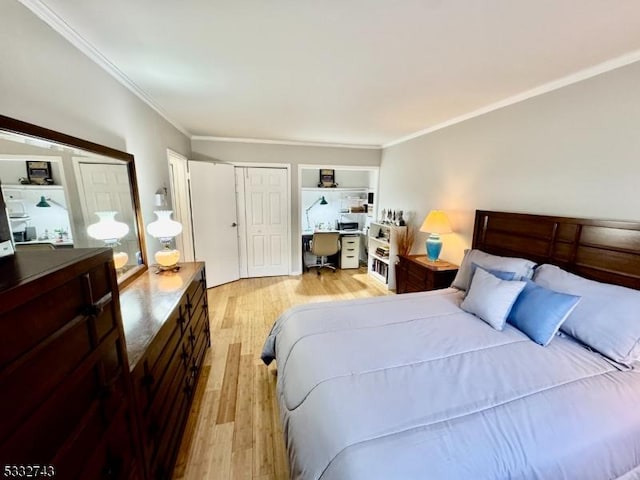 bedroom with a closet, crown molding, and light hardwood / wood-style floors