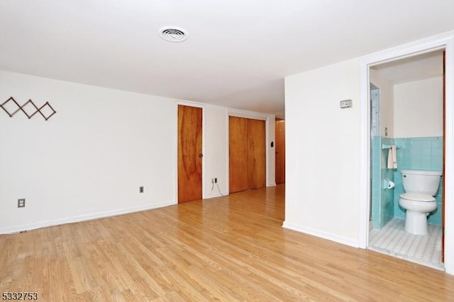 empty room featuring light hardwood / wood-style floors