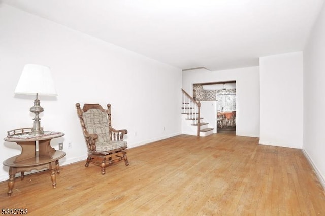 sitting room featuring hardwood / wood-style flooring