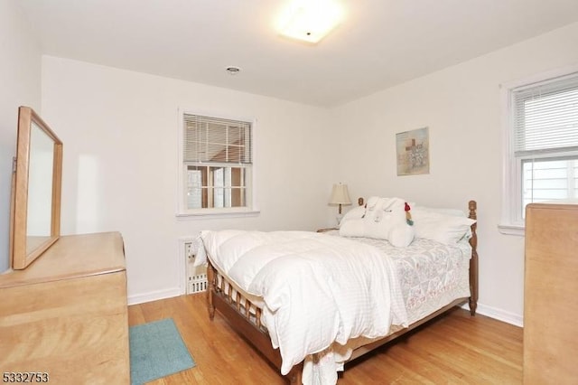 bedroom featuring hardwood / wood-style floors