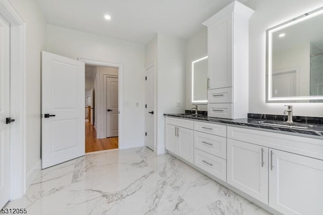 bathroom featuring vanity and walk in shower