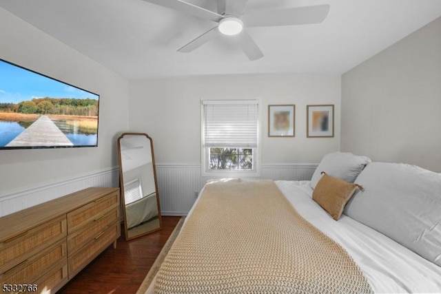 bedroom featuring ceiling fan and dark hardwood / wood-style flooring