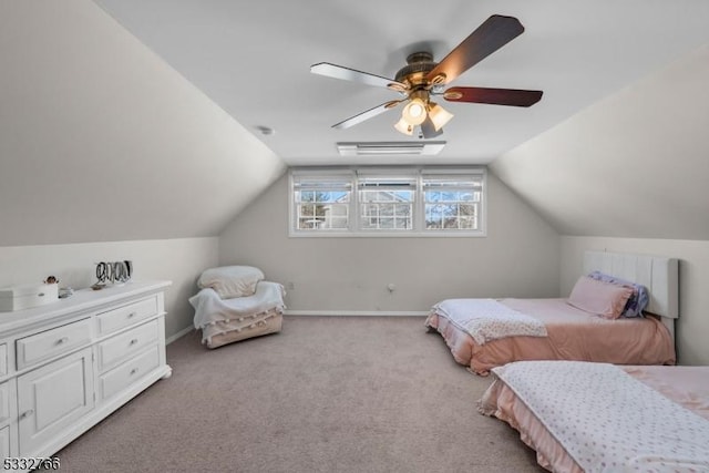 carpeted bedroom featuring vaulted ceiling and ceiling fan