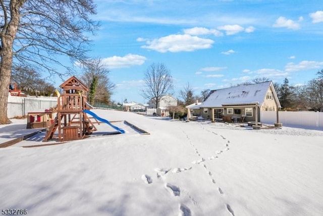 view of snow covered playground