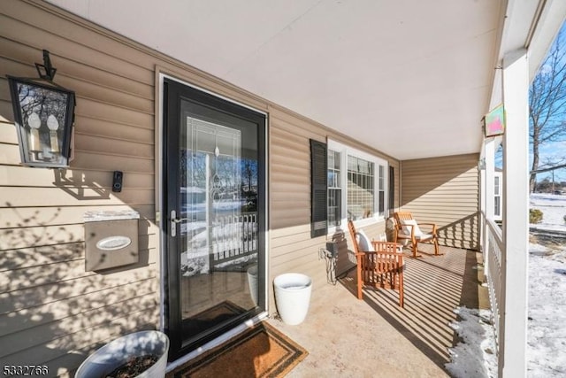 balcony featuring covered porch