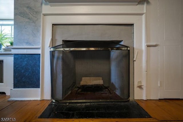 interior details featuring wood-type flooring