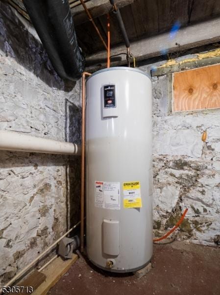 utility room featuring electric water heater