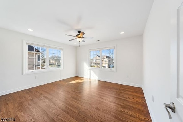 unfurnished room featuring ceiling fan and wood-type flooring