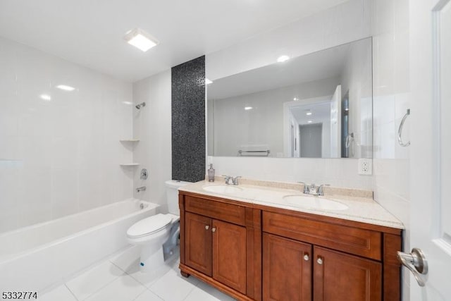 full bathroom featuring vanity, toilet, tile patterned floors, and shower / washtub combination