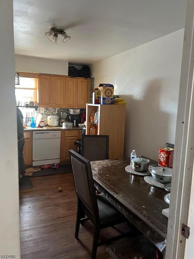 dining room featuring dark hardwood / wood-style flooring