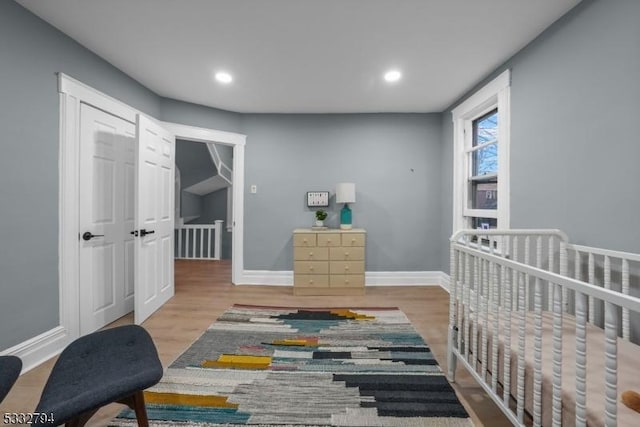 bedroom with light hardwood / wood-style flooring