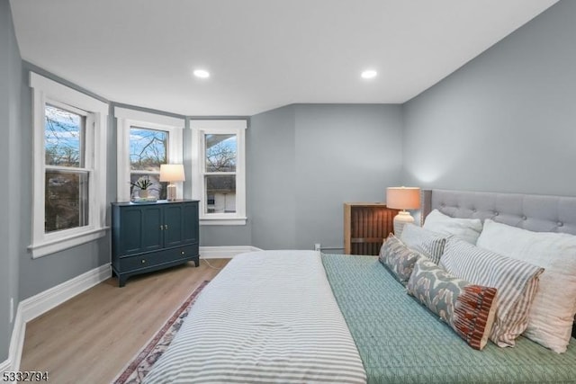 bedroom featuring light hardwood / wood-style flooring