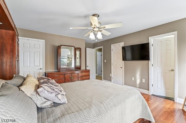 bedroom featuring ceiling fan and light hardwood / wood-style flooring