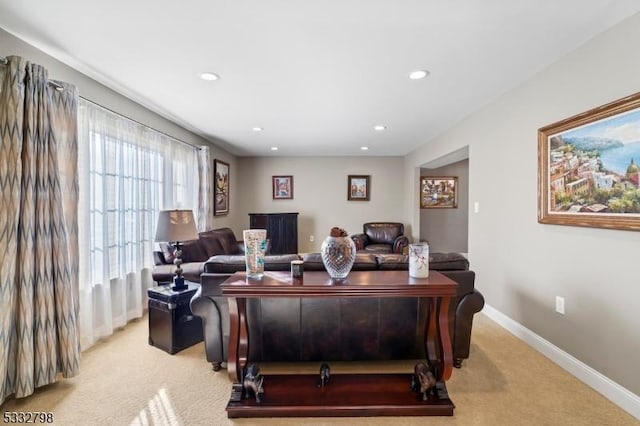 office area featuring light colored carpet