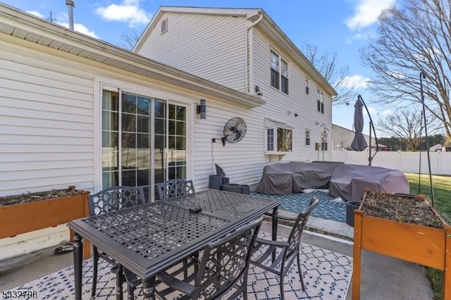 rear view of house with a patio area