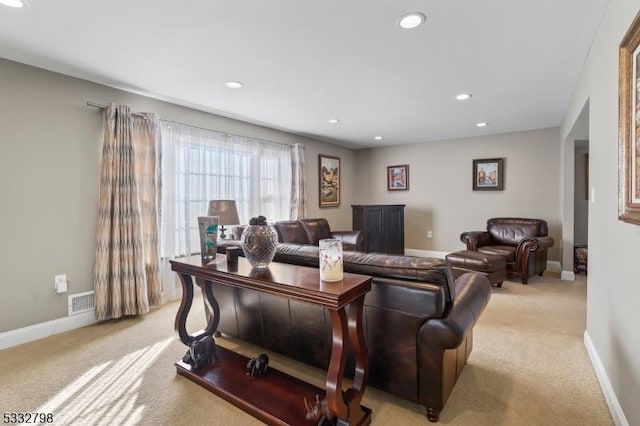 living room with light colored carpet