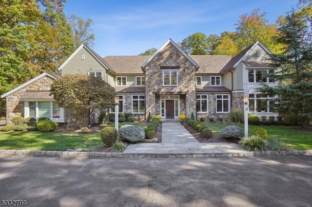 view of front of property with a front lawn