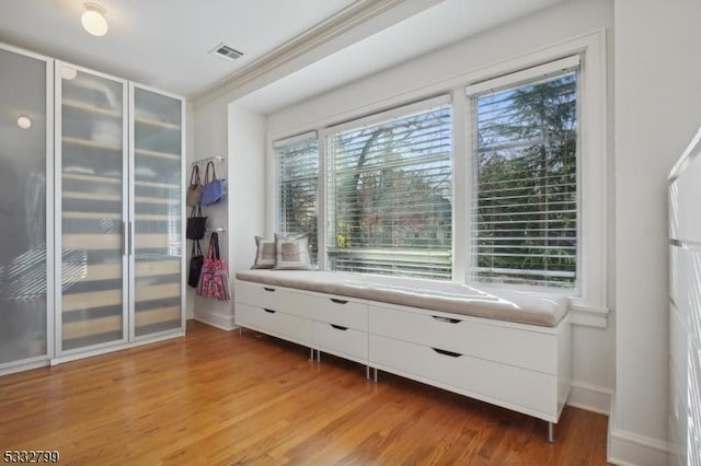 unfurnished room with wood-type flooring