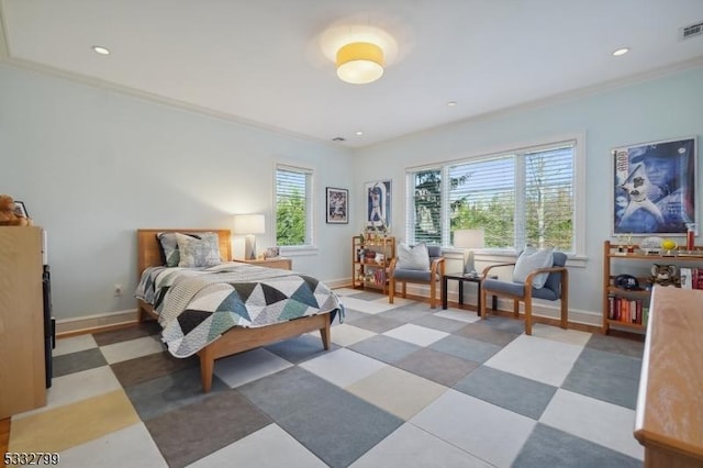 bedroom with crown molding